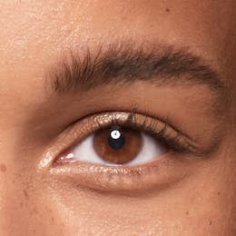 Before applying SWATI vegan & cruelty-free Tourmaline lash + brow booster serum