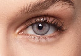 Brown eyes after wearing SWATI Pearl - Grey Coloured lenses