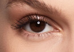 Brown eyes before wearing SWATI Pearl - Grey Coloured lenses