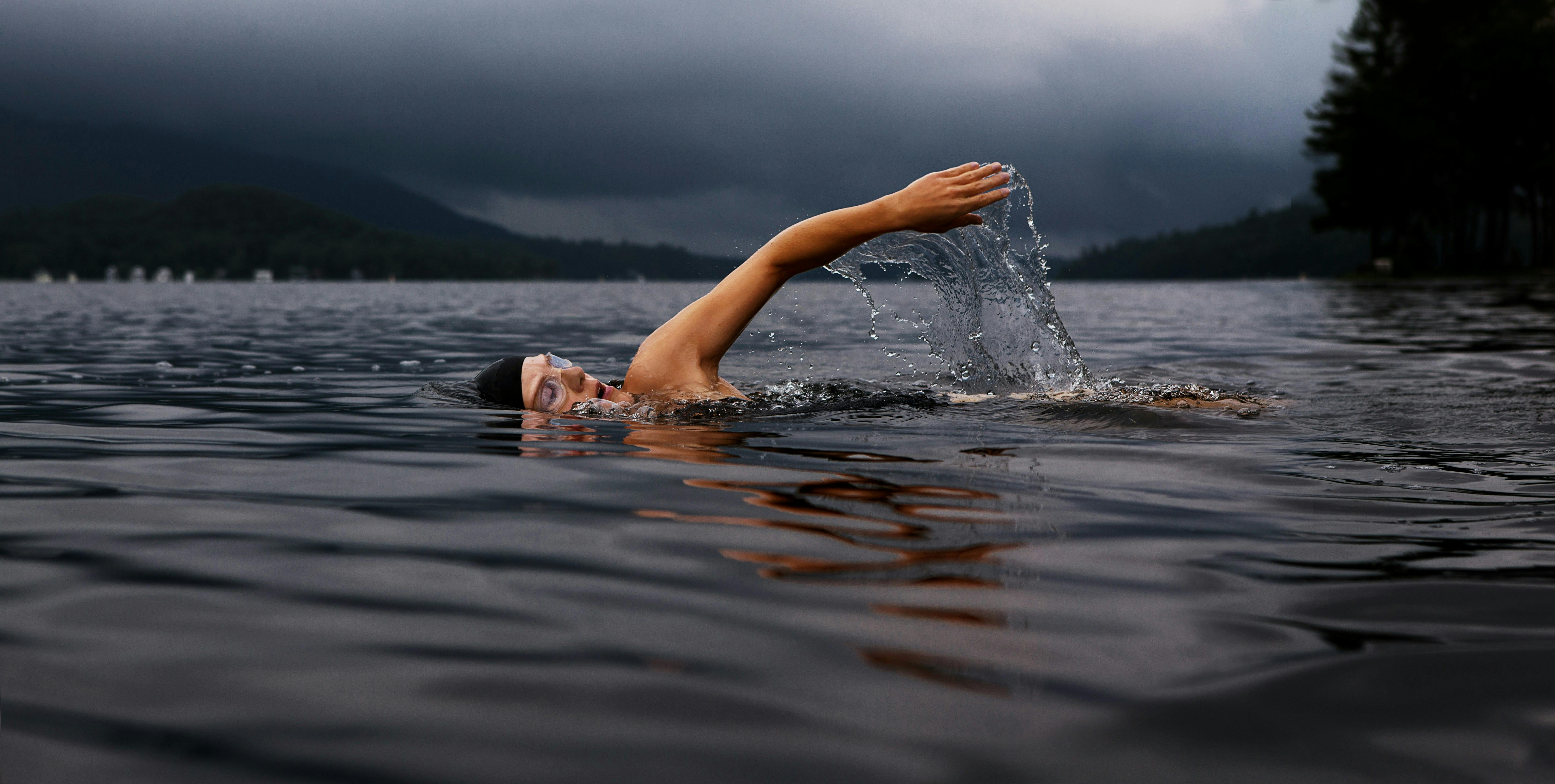 Person swimming in a lake 