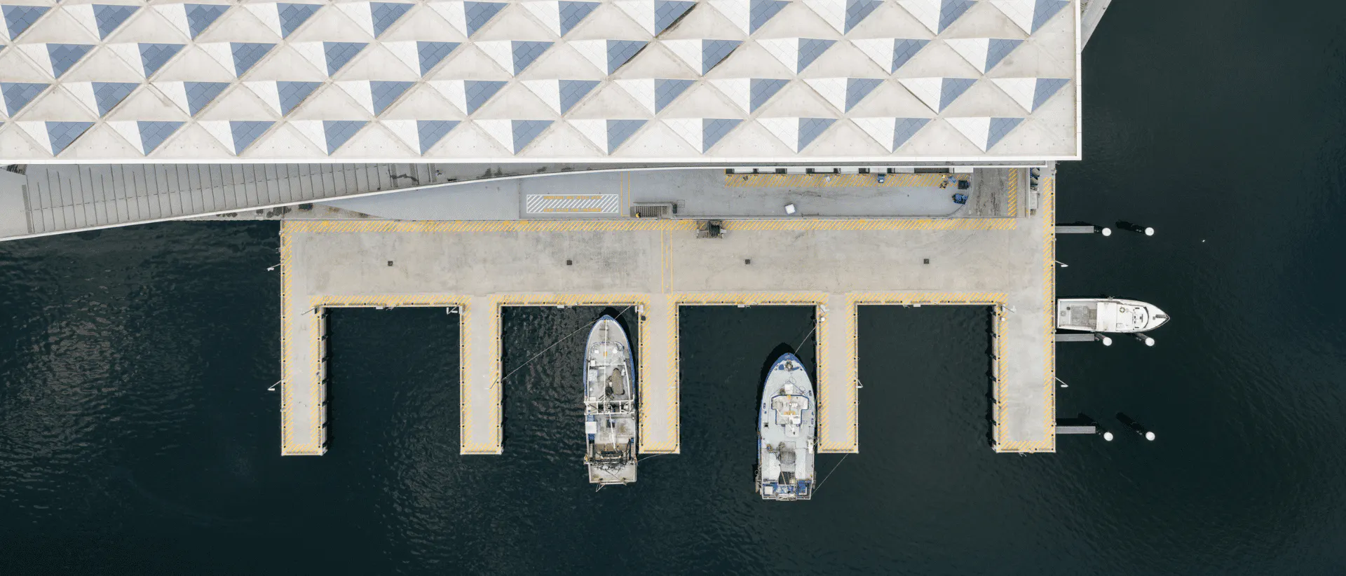 Top-down view of Sydney Fish Markets, including the pier.