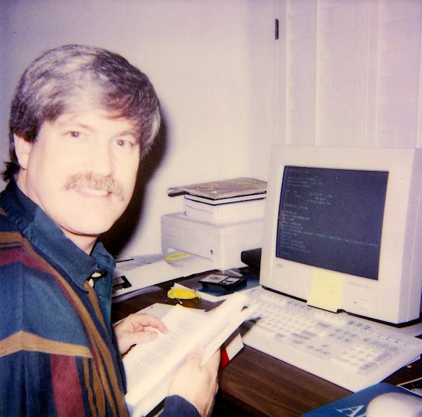 Tom Reahard on his computer