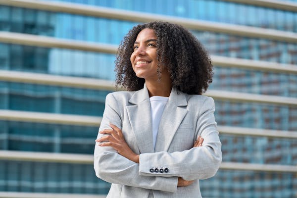 Woman in front of building