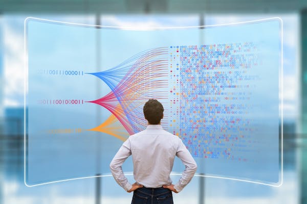 Man looking at complex code