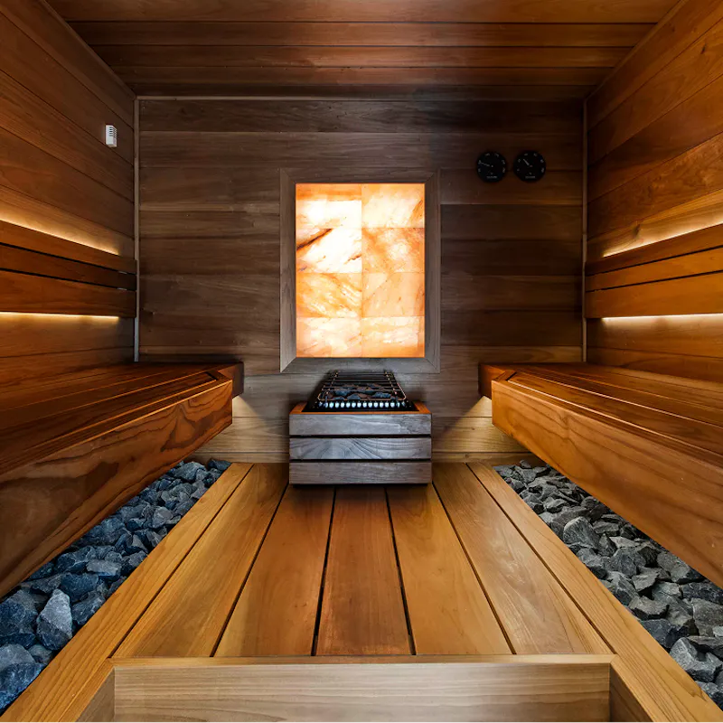 Indoor cedar sauna with warm lighting
