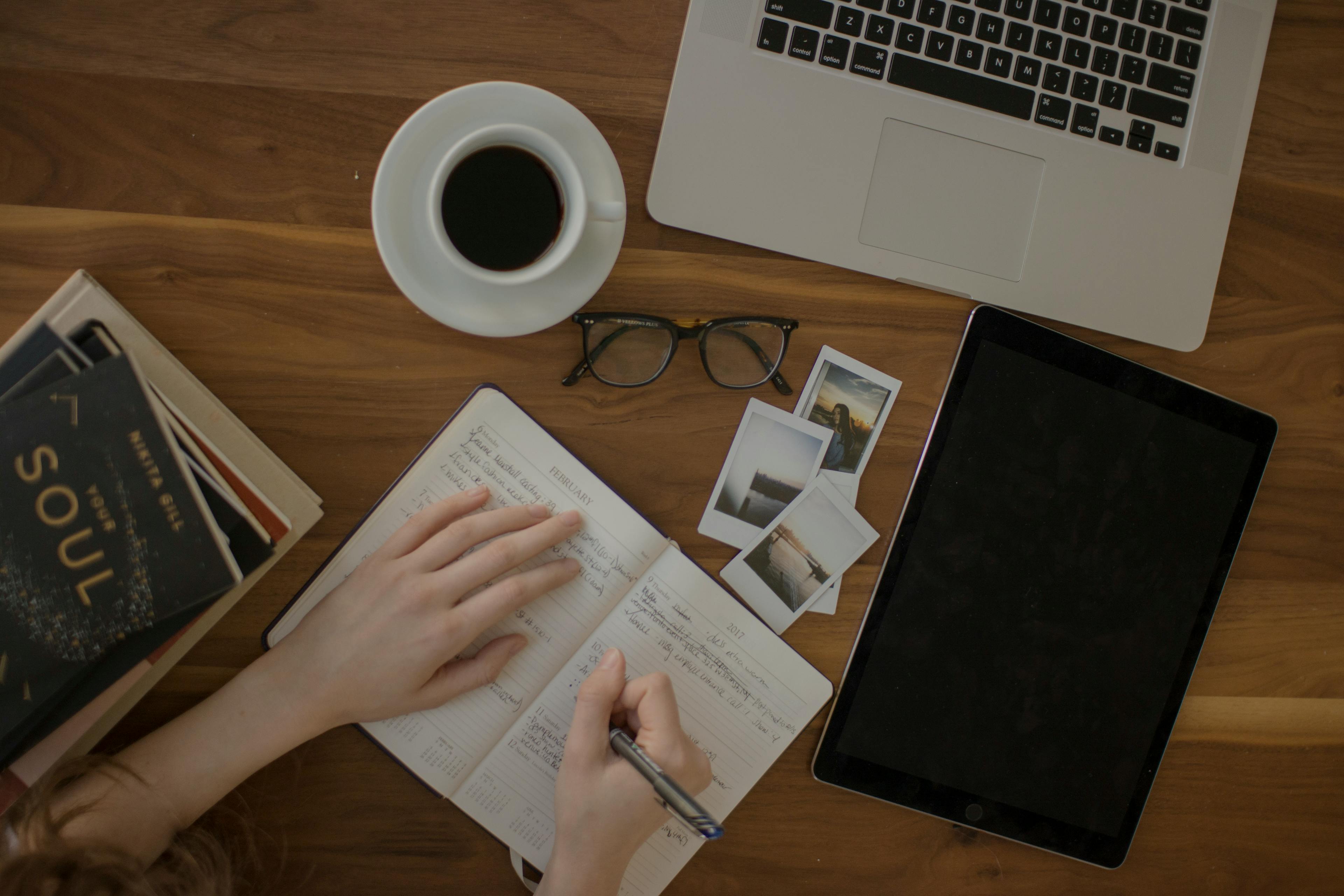 Image of person working with pen and paper