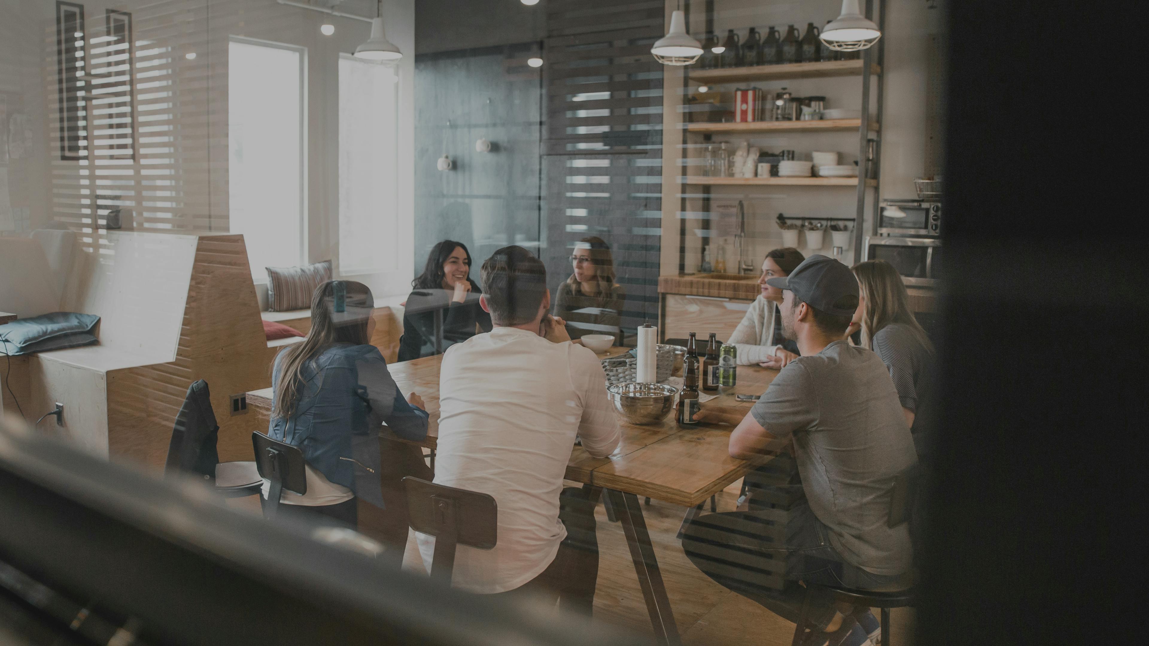 People sitting in kitchen