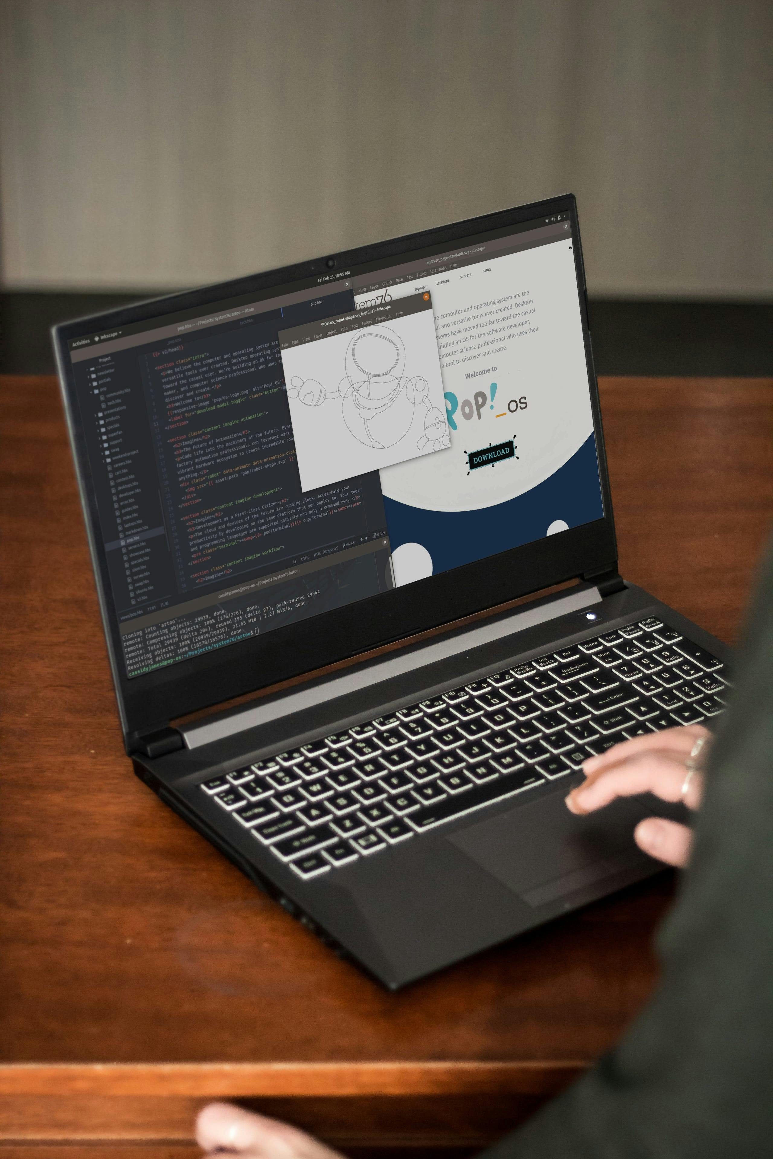 A person working on a vector drawing of a robot in Inkscape.