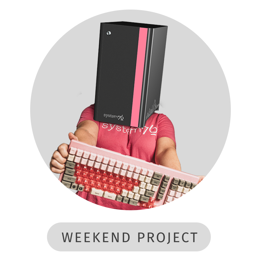 The keyboardist member of Theliohead holding up a pink keyboard that functions as a piano