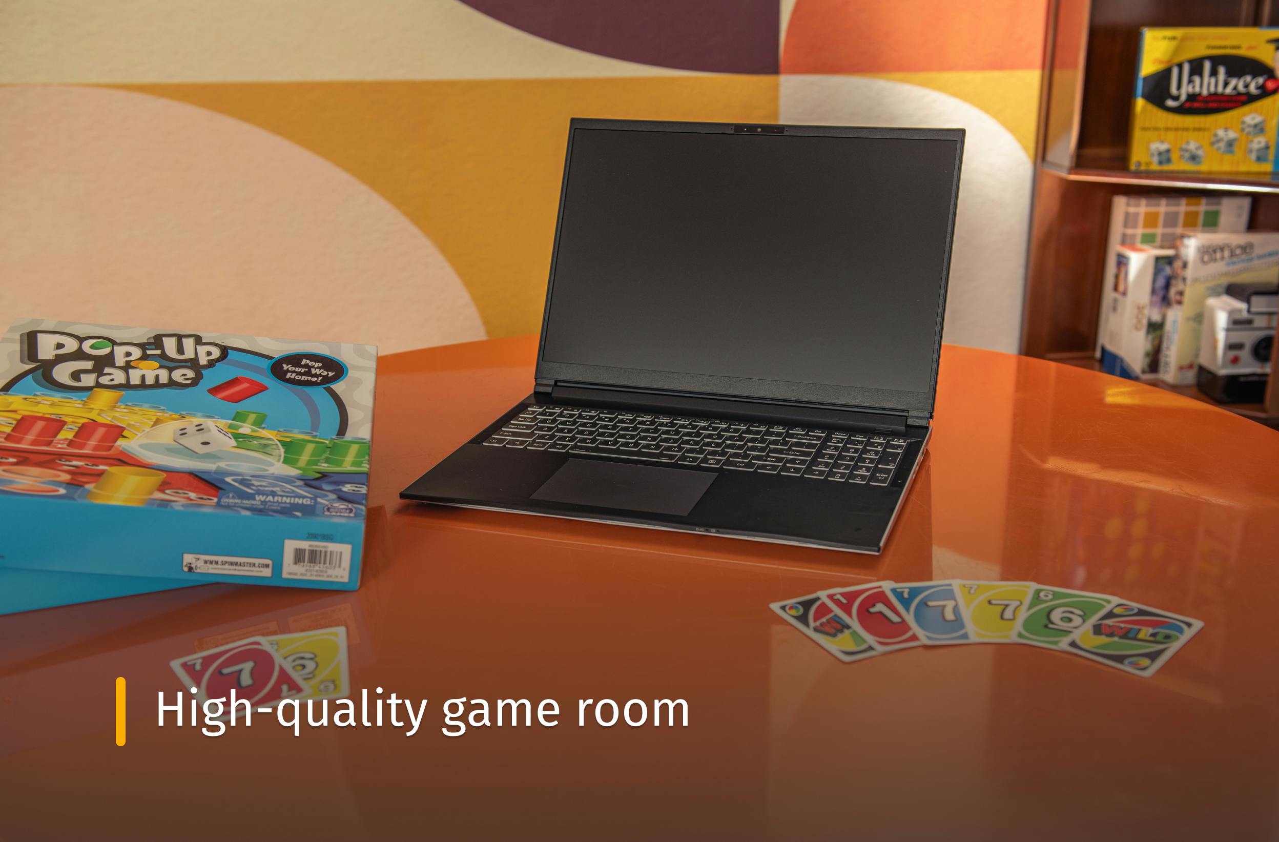 Darter Pro on a game table with cards and text that reads "High-quality game room"