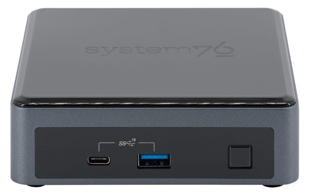 A front-facing view of the Meerkat Mini Desktop, featuring USB-C and USB-A front ports.