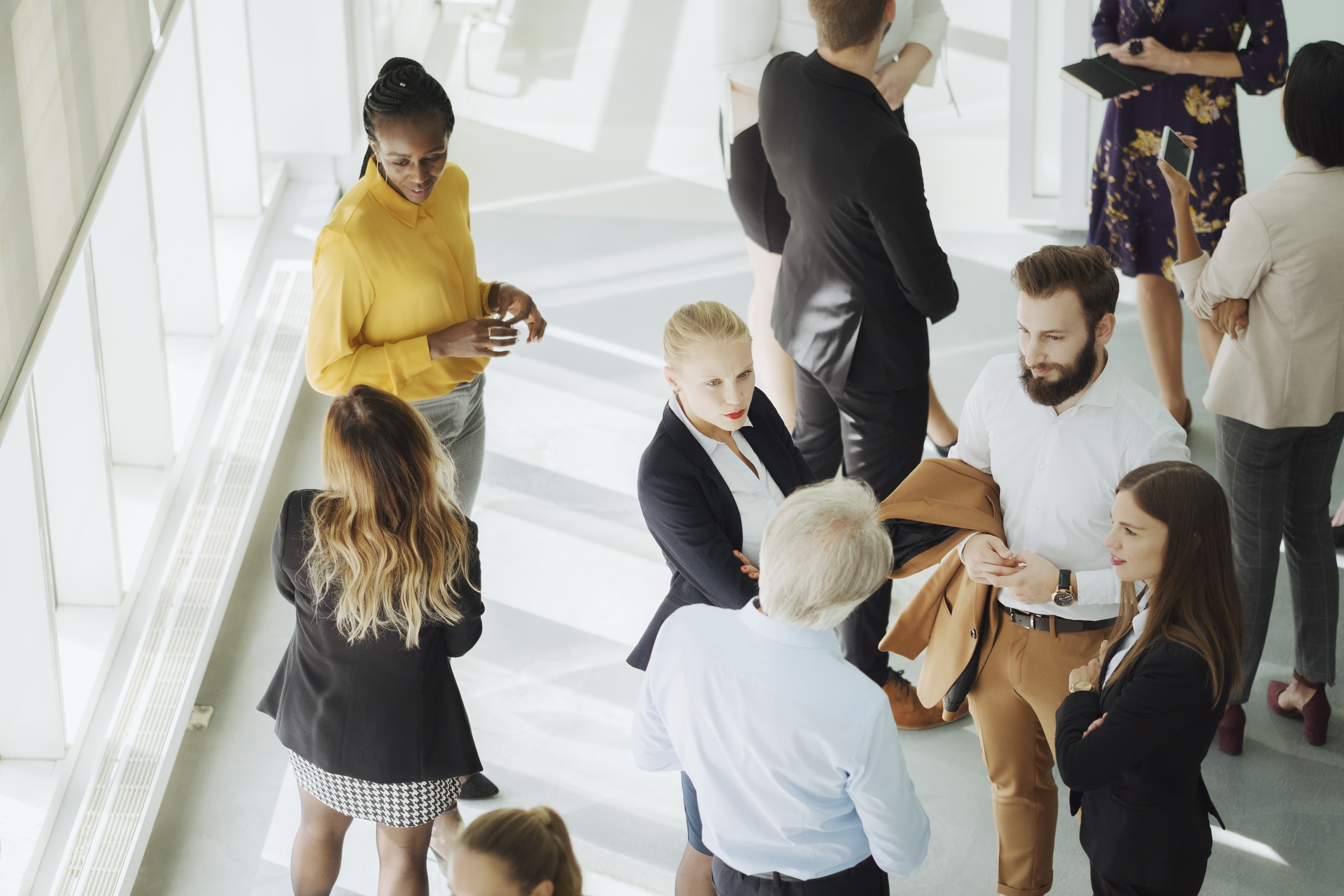 Black woman isolated from co-workers