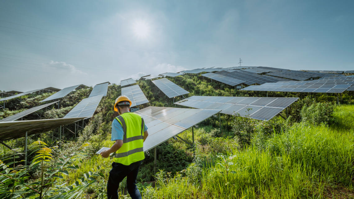 Man installing solar panels