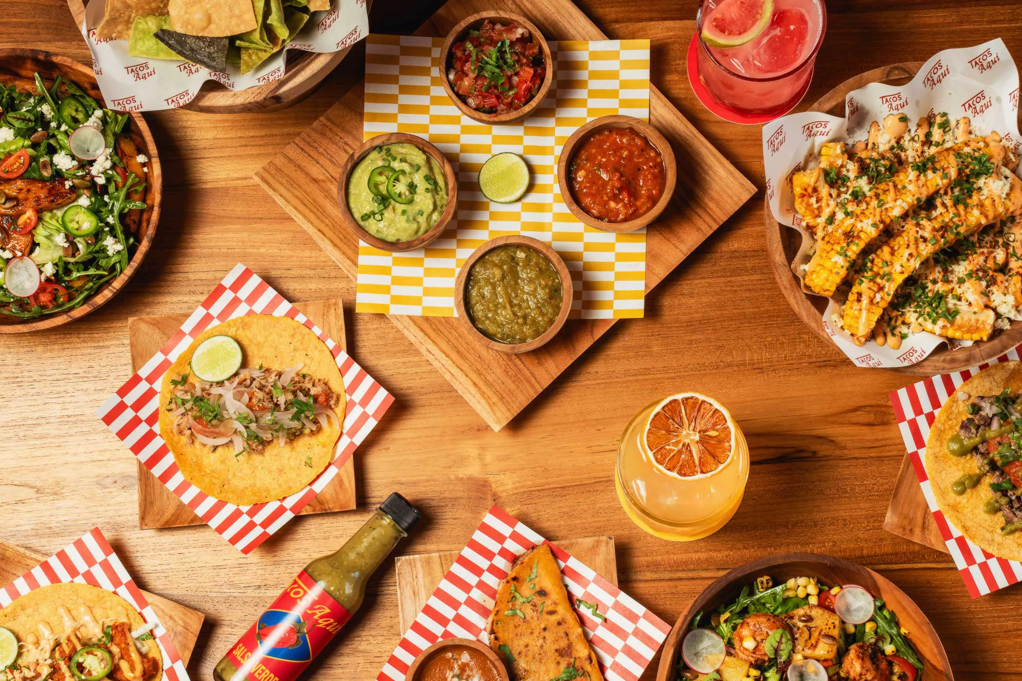 delicious looking food all laying on a table, view from above