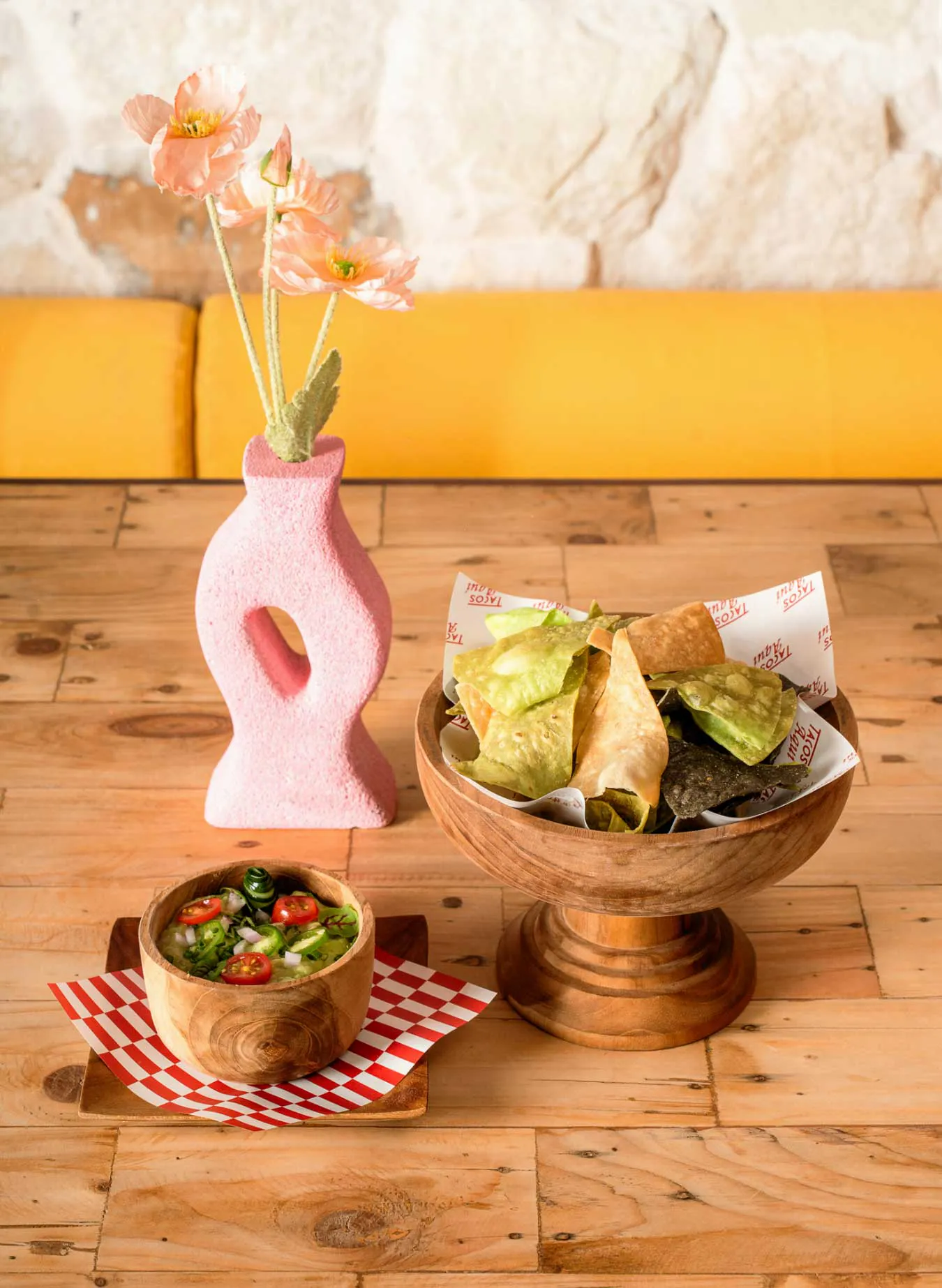 chips and salsa on a wooden table