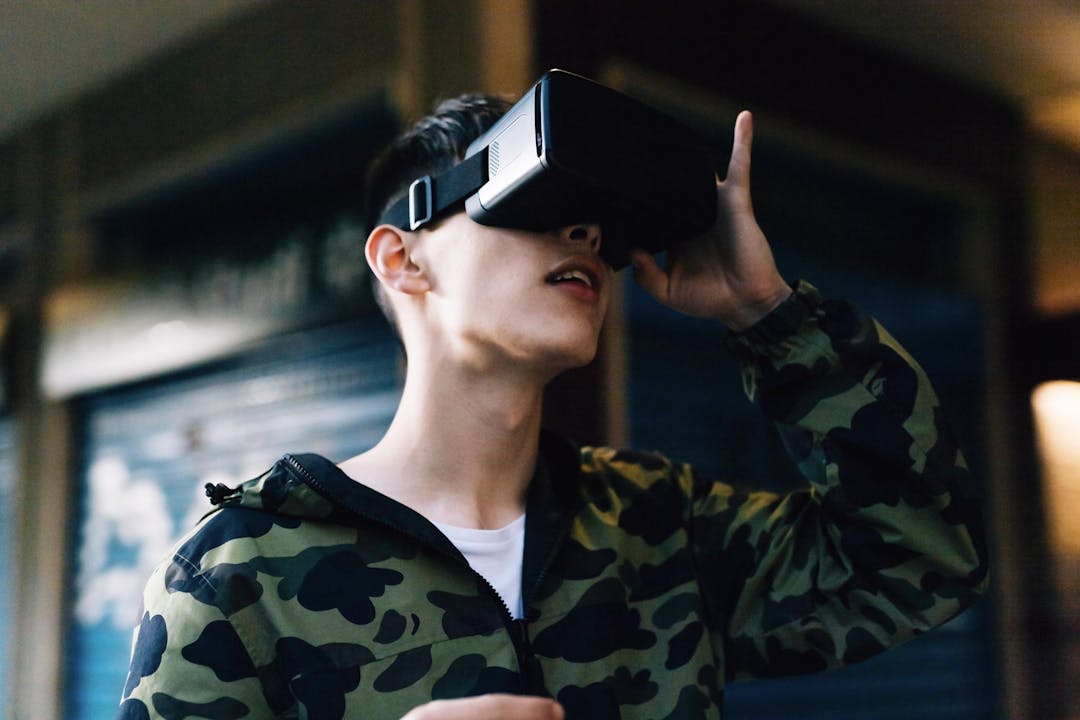 Gamer with soldier suit using VR virtual