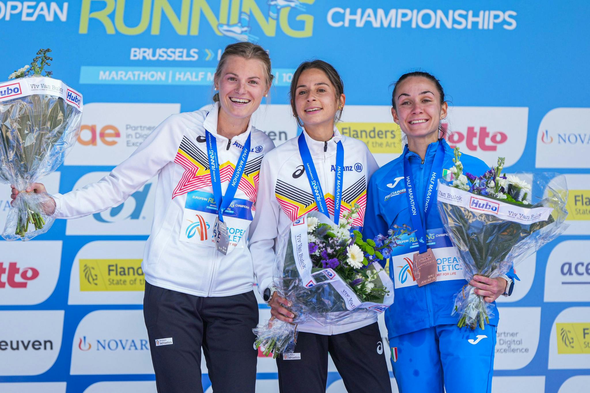 Herbiet, Thomas, and Nestola form the podium in the half marathon