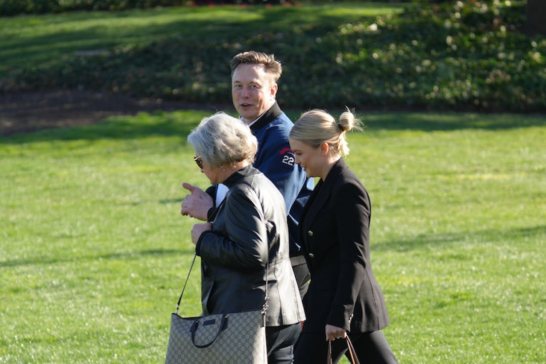 Elon Musk walking 