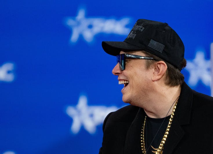 Elon Musk laughing