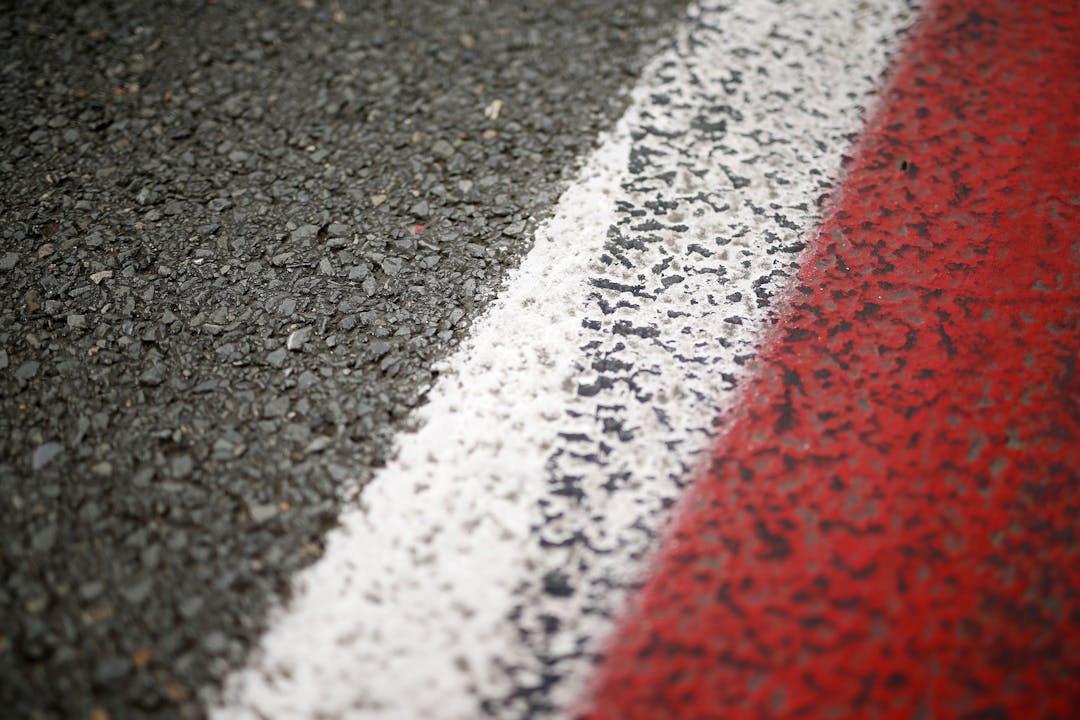 Red line on track and road