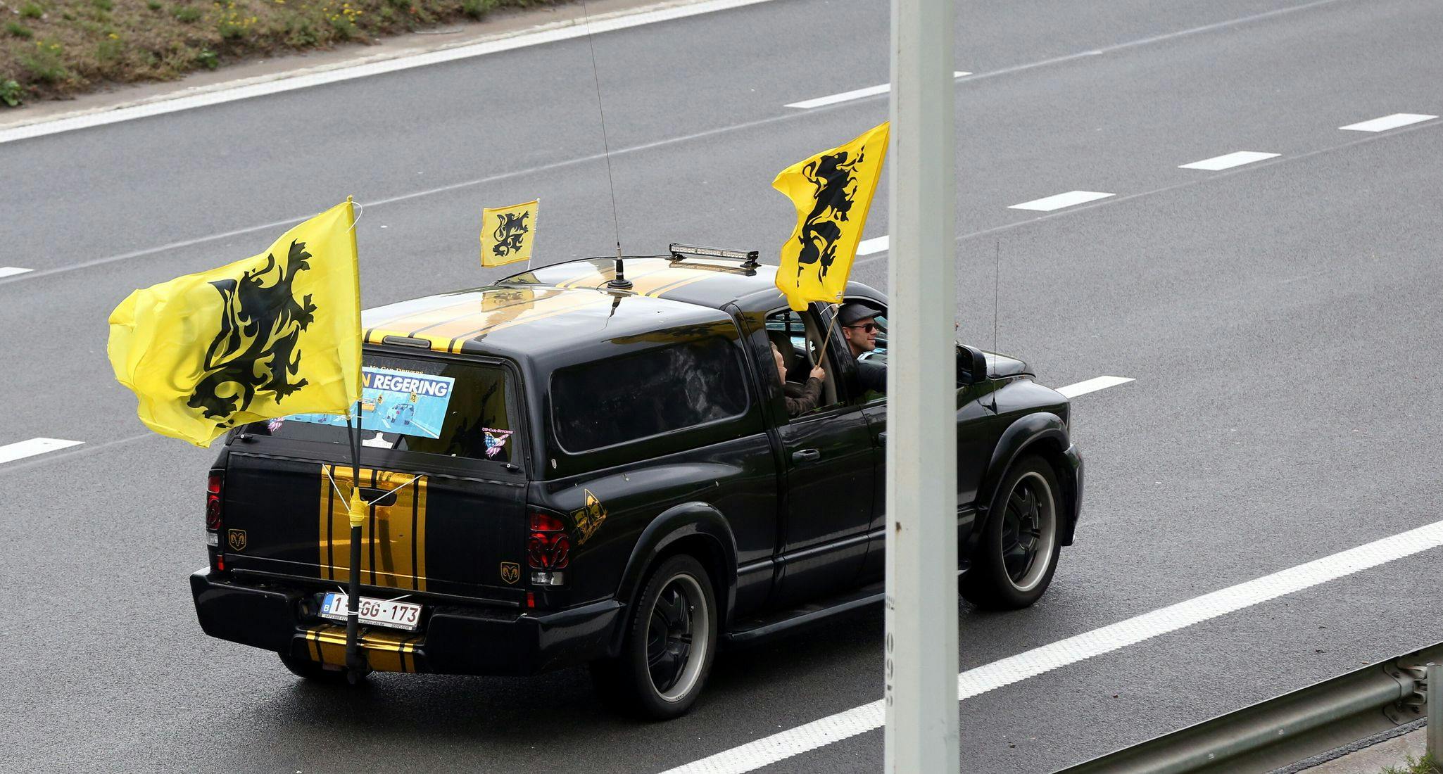 Extreme right fans with Vlaams Belang flag