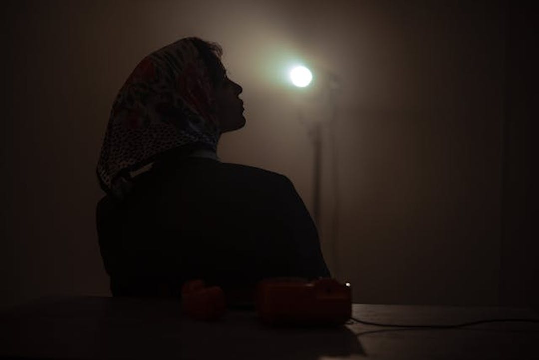 Woman in darkness