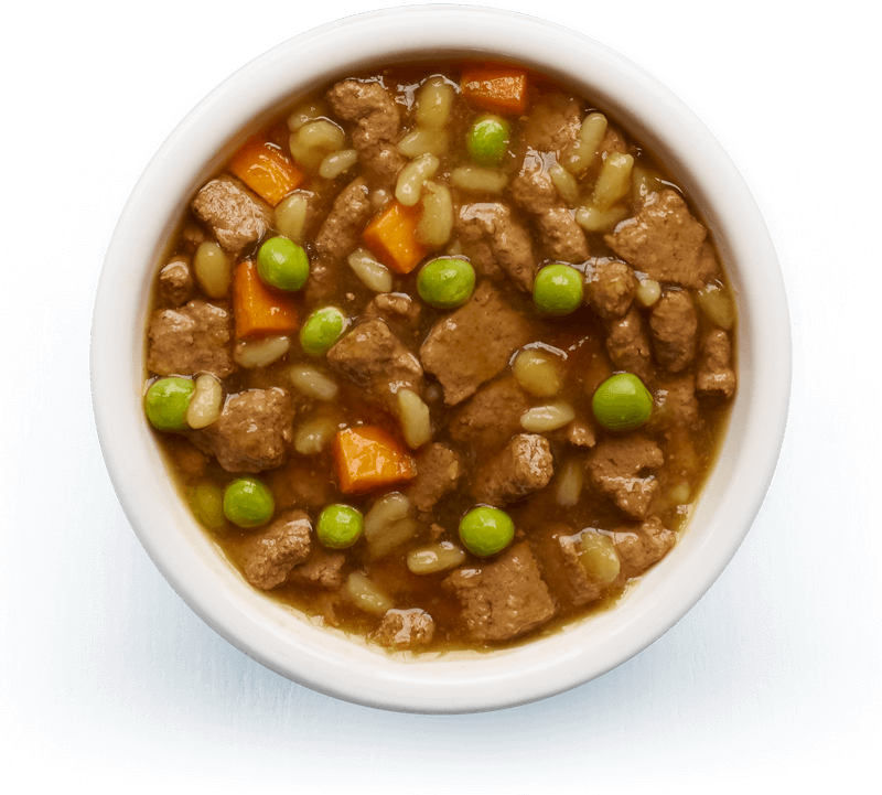 An image of Tails wet food. Slow-cooked stew with beef, rice & vegetables in tasty gravy