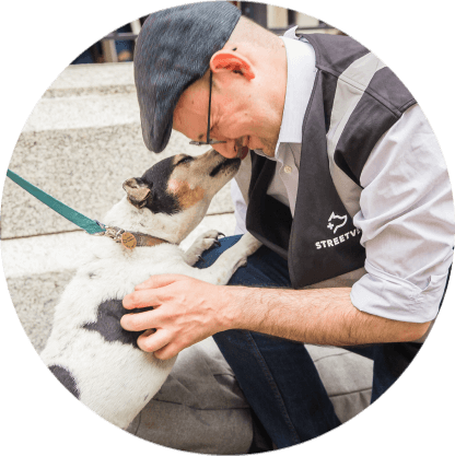 StreetVet volunteer with a Jack Russel