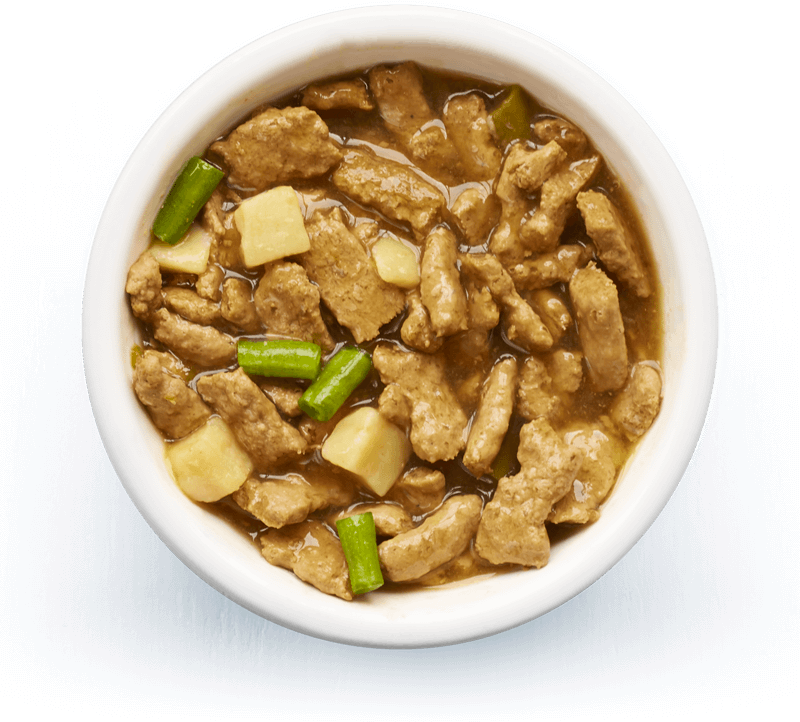 An image of Tails wet food. Country casserole with chicken, potato & green beans in tasty gravy.