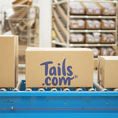 a tails.com box at the factory