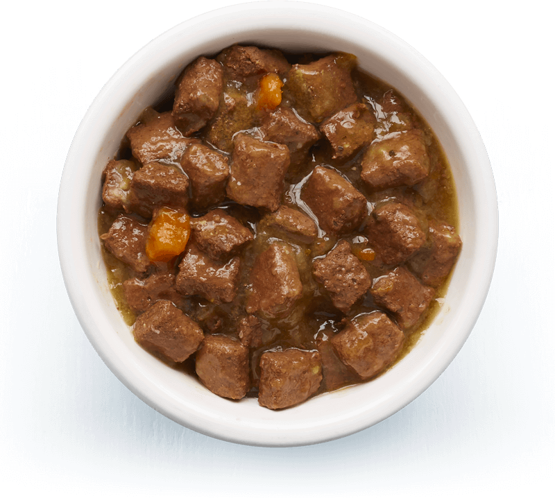 An image of Tails wet food. Shepherd's hotpot with lamb, vegetables & rosemary in tasty gravy.