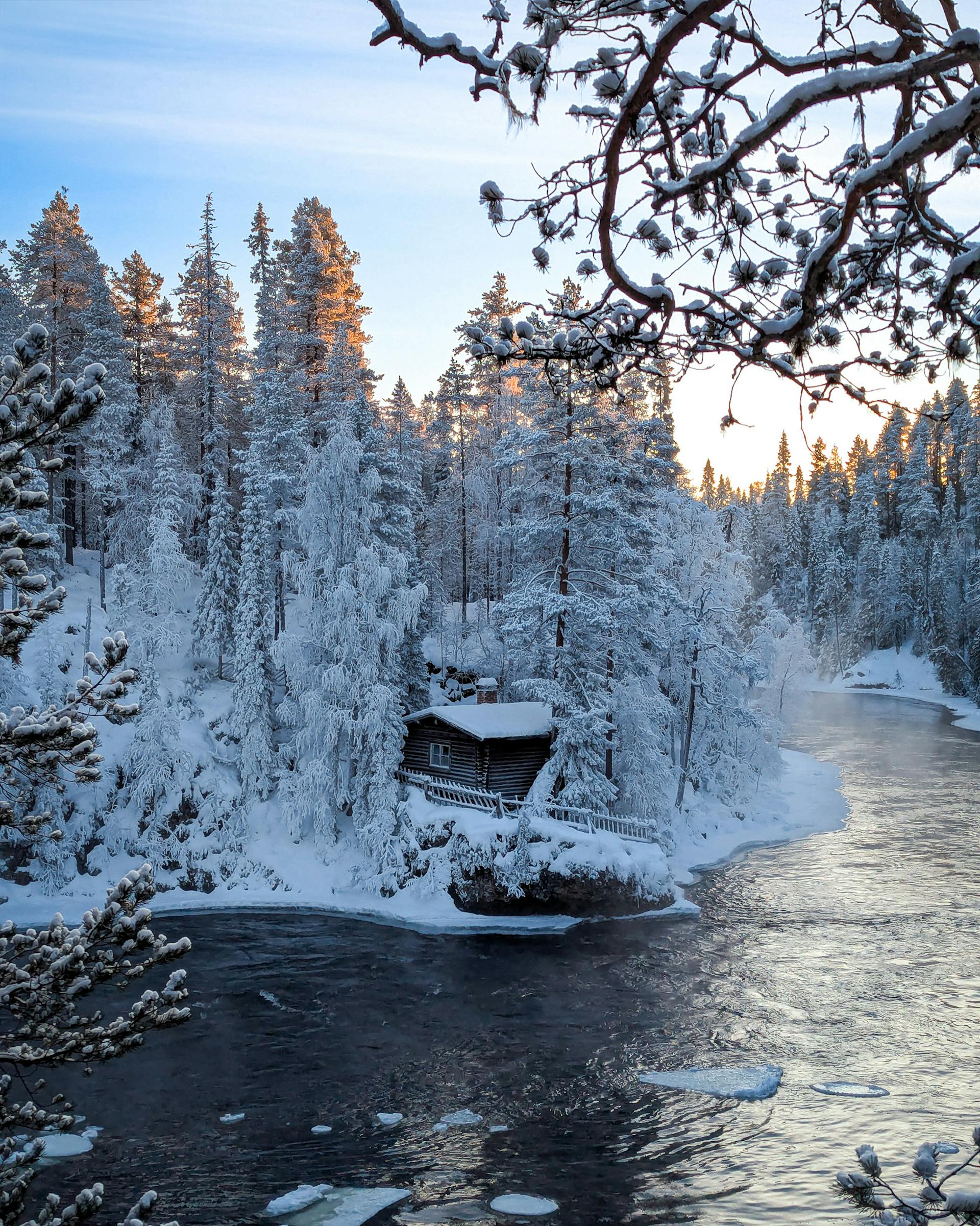 Cabin on the river in Karhunkierros Trail
