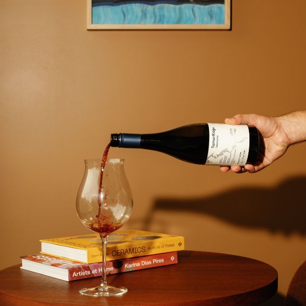 Wine being poured into a glass