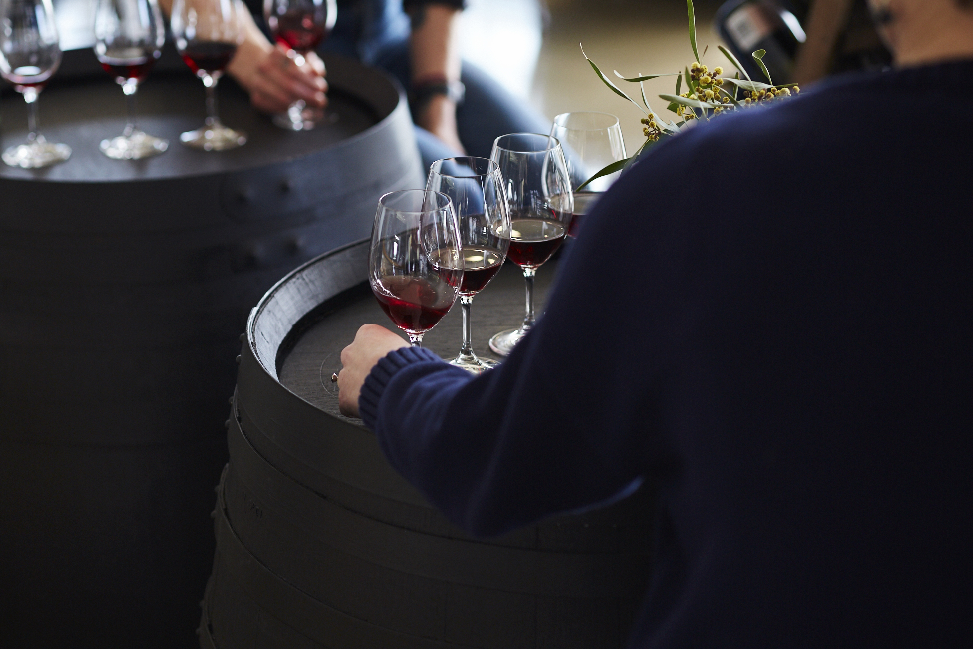 Holding wine glasses on barrel