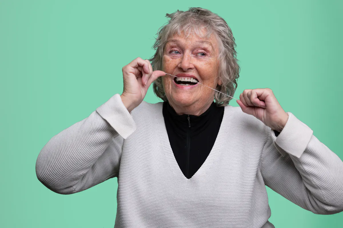 Older women flossing