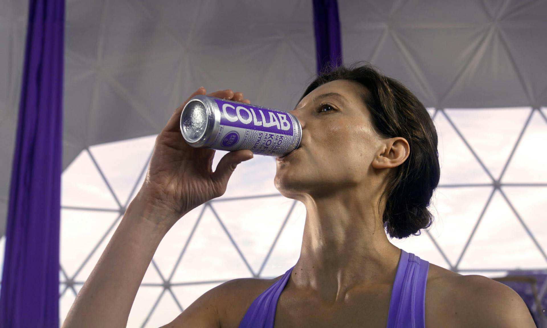 Woman drinking an energy drink