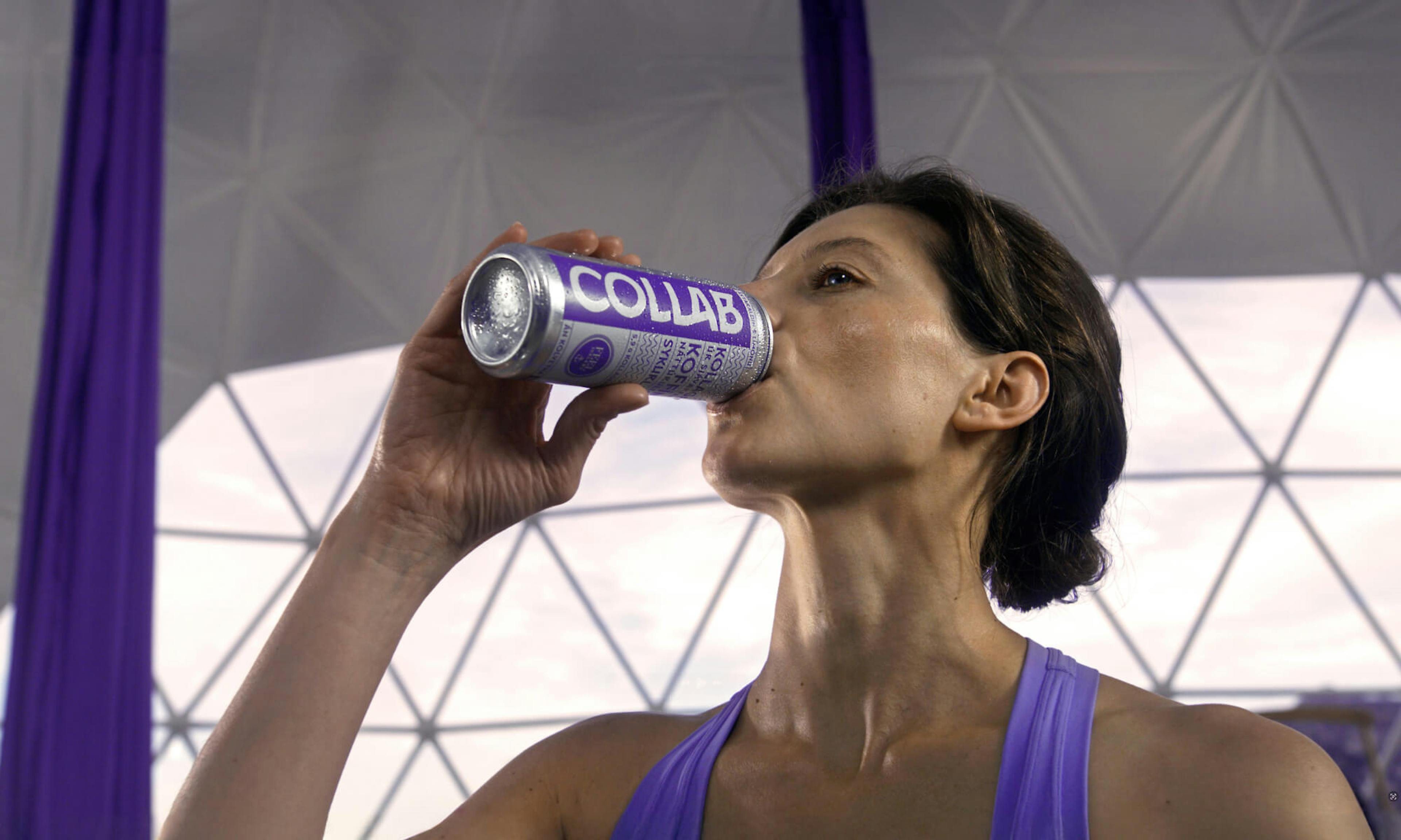 Woman drinking an energy drink
