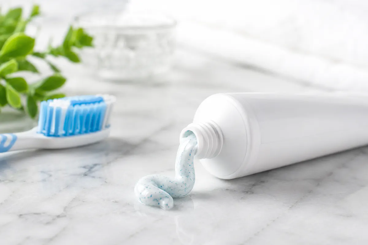 Squirt of Toothpaste on marble counter