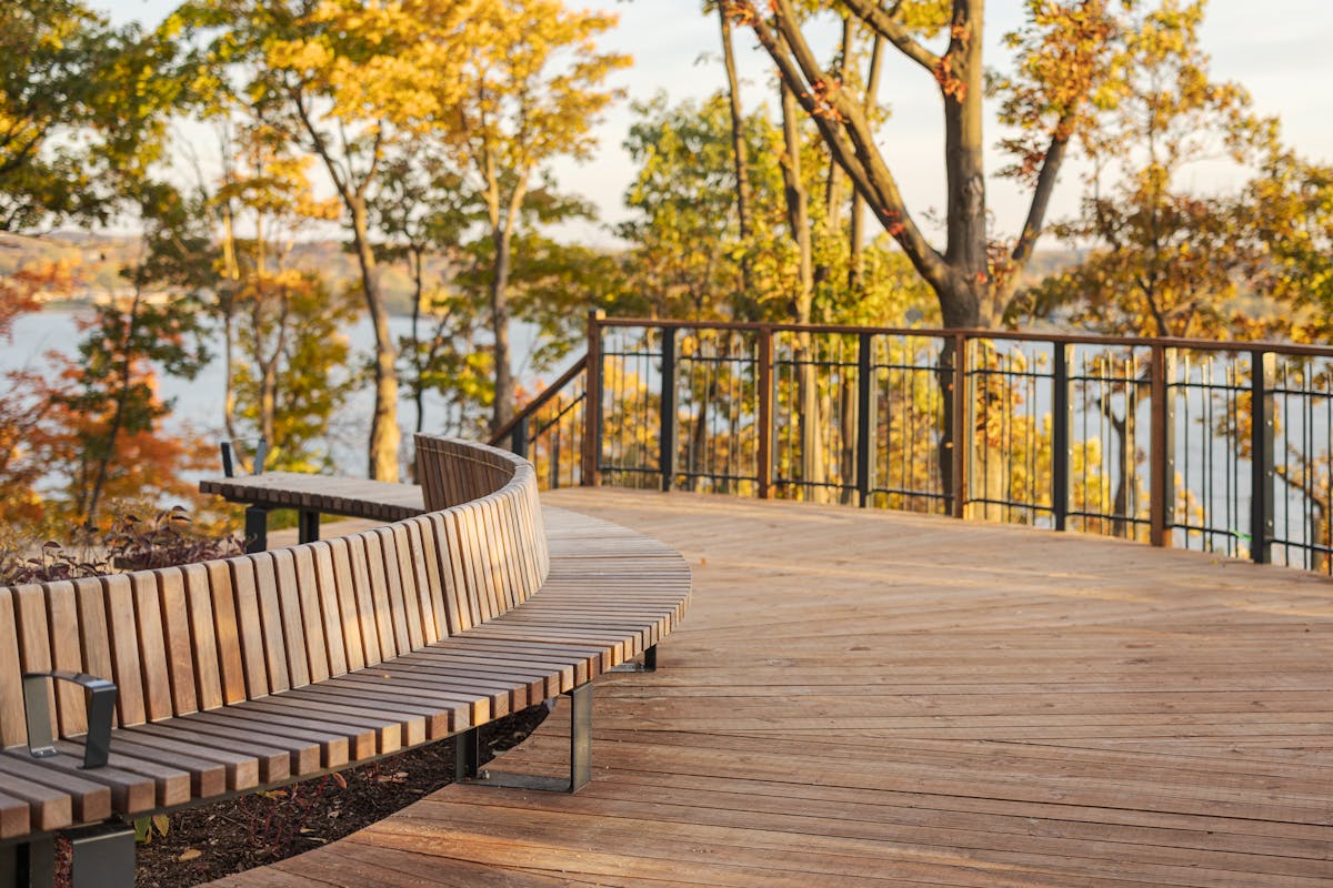 Wooden bench and observation platform in autumn in the Quebec region.