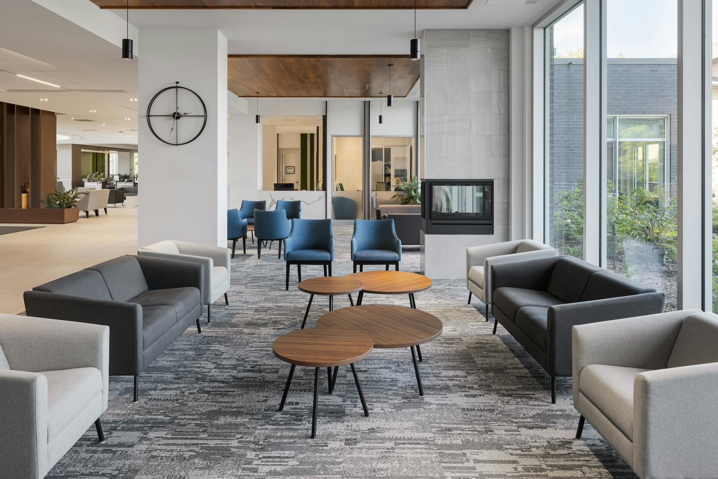 Photograph of the interior design and architecture of a living room with modern and colorful furniture