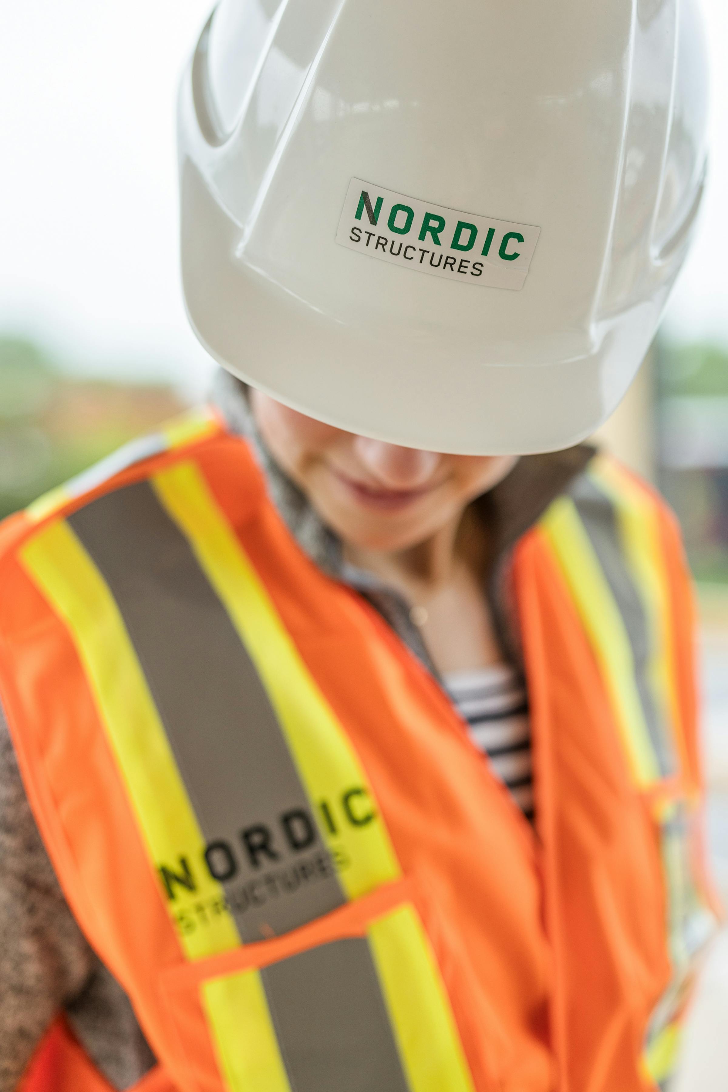 Person wearing this personal safety equipment or the Nordic Structure employer brand