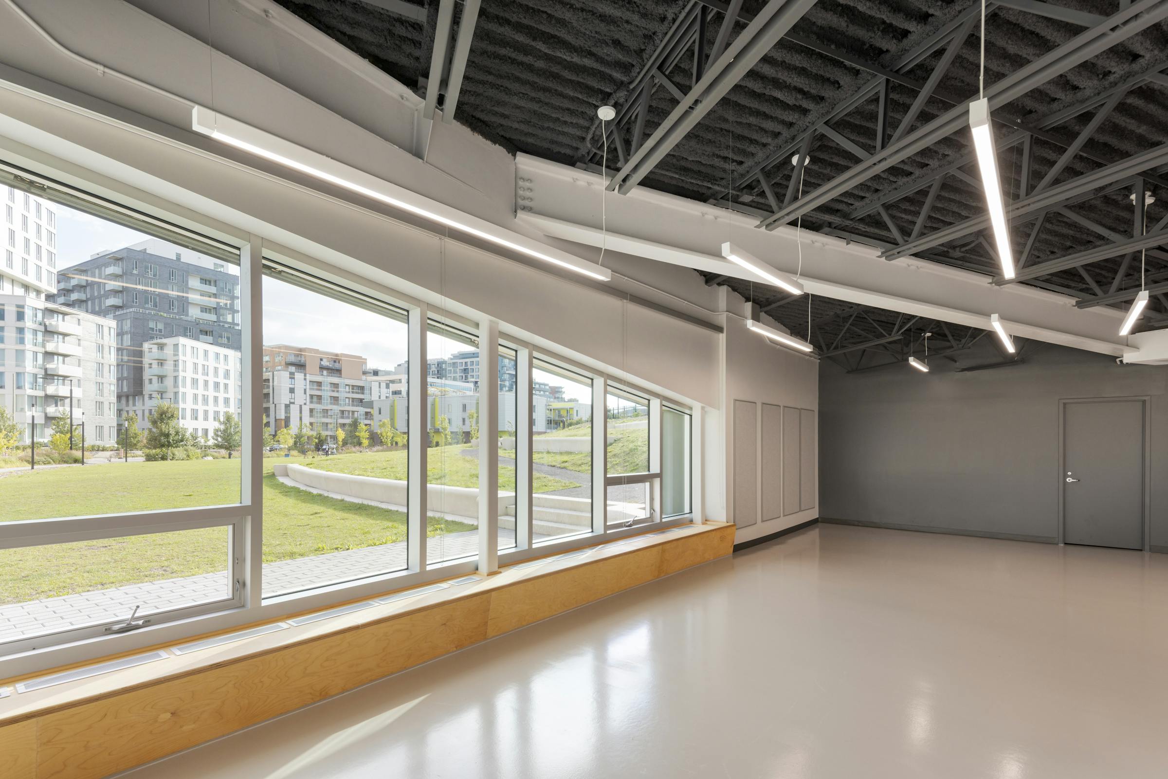 Photograph of the interior fittings of a community center with modern architecture.