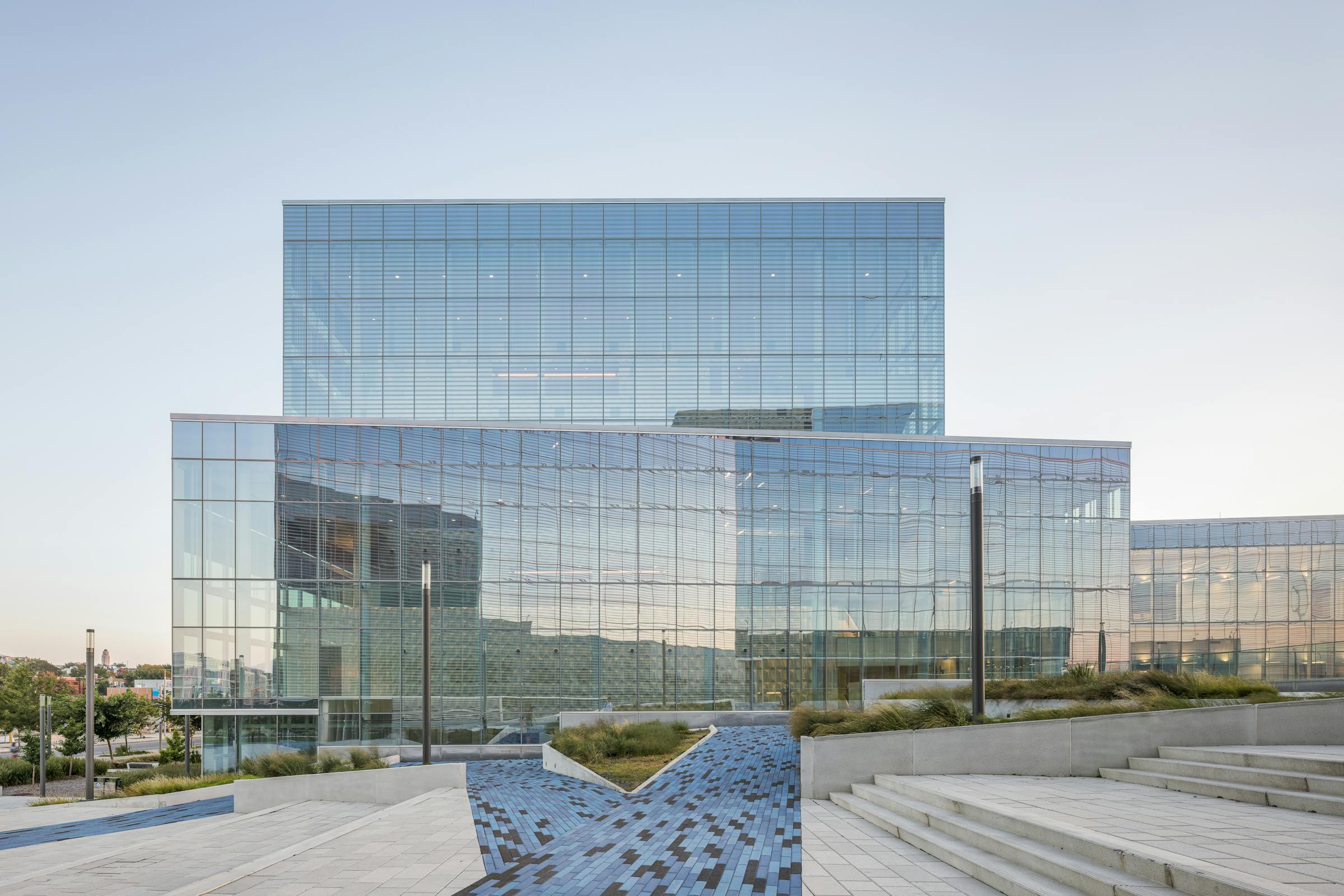 Photograph of the glass facade with mirror effect of a university building in Montreal.