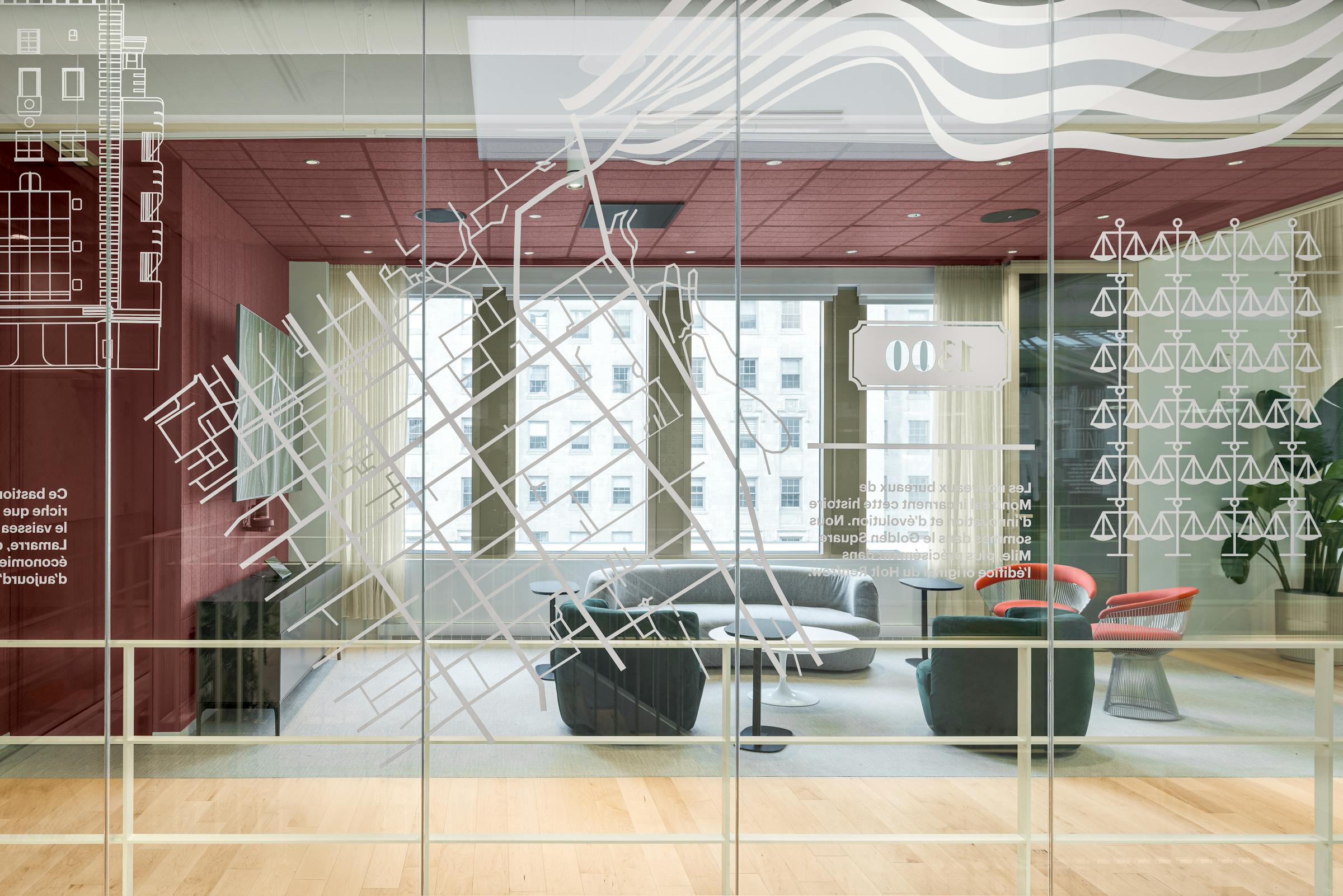 Mur vitré graphique illustrant les bureaux régionaux de Cain Lamarre.