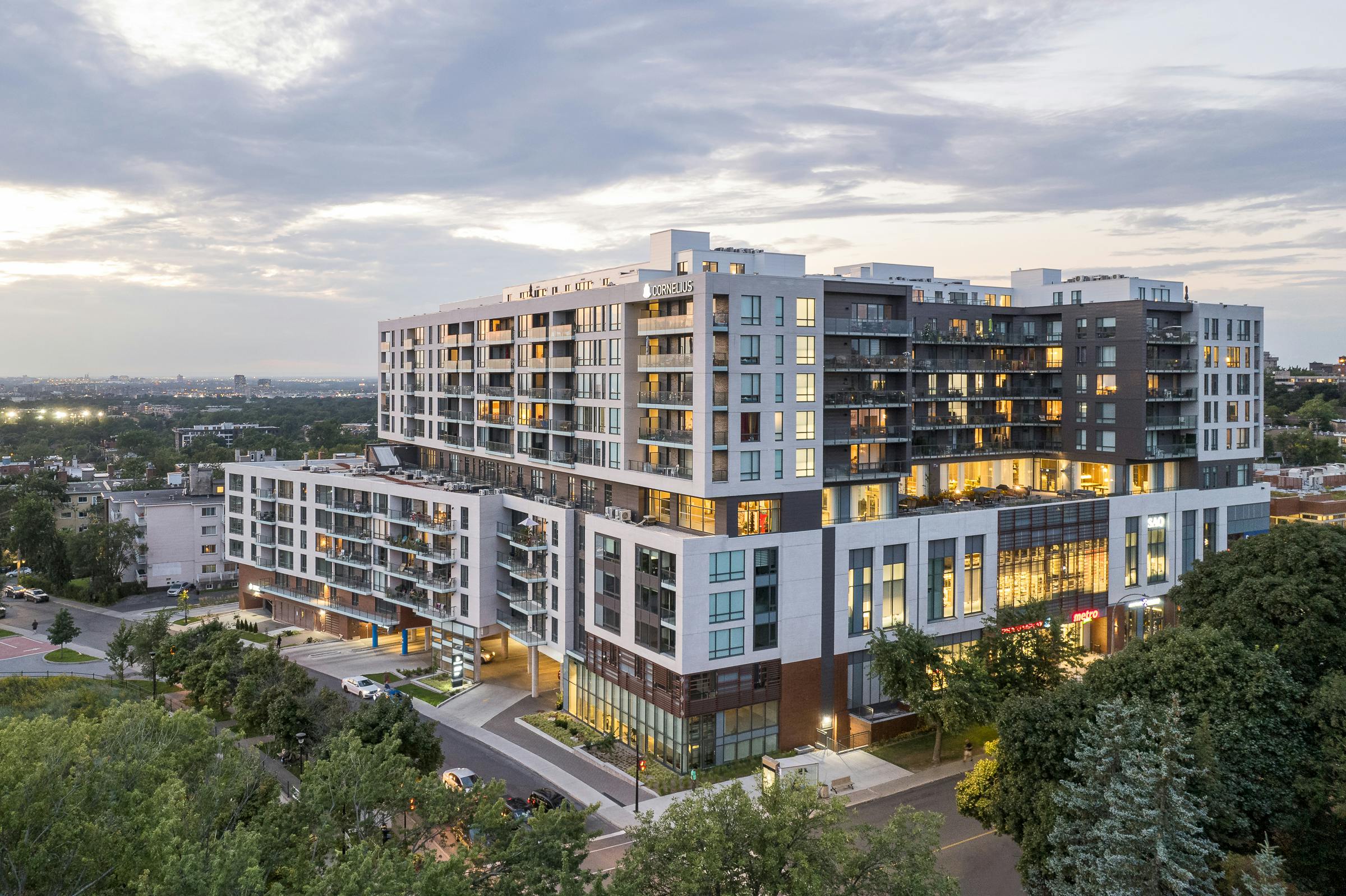 Night view of the exterior architecture of the complex in Montreal