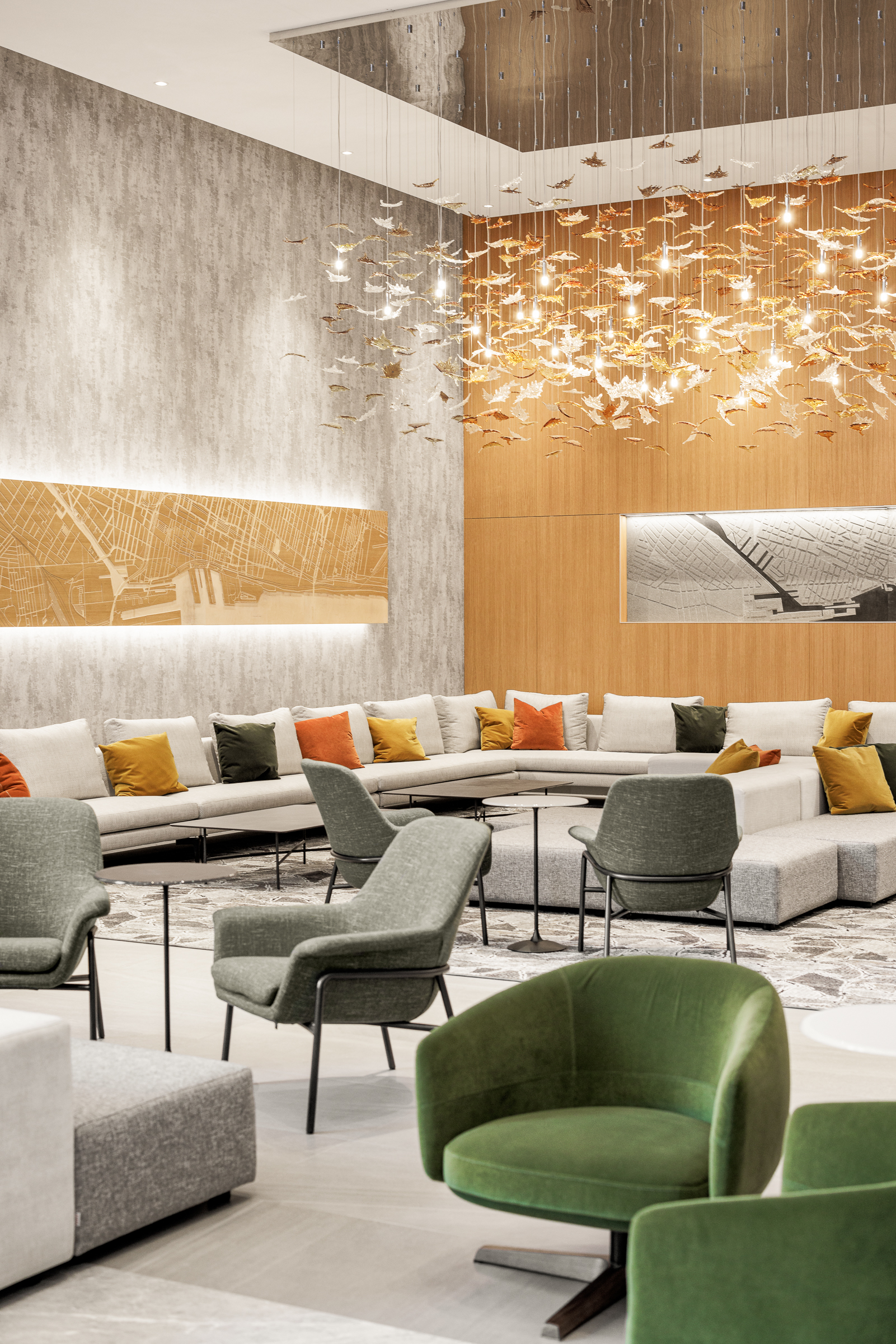 Espaces communs élégants et bien éclairés du lobby intérieur au complexe 700 St-Jacques, Montréal