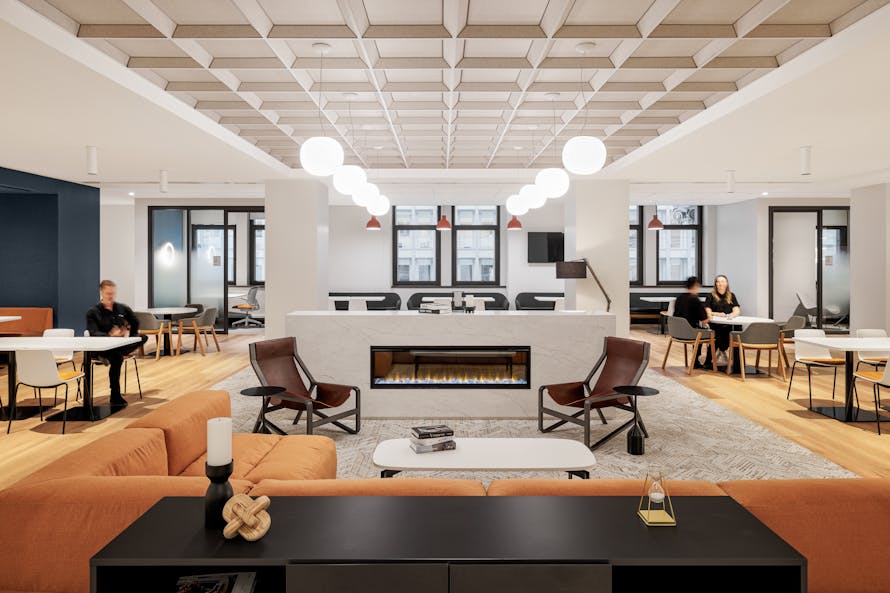 Work café lumineux : un coin détente mariant design contemporain et architecture fonctionnelle.