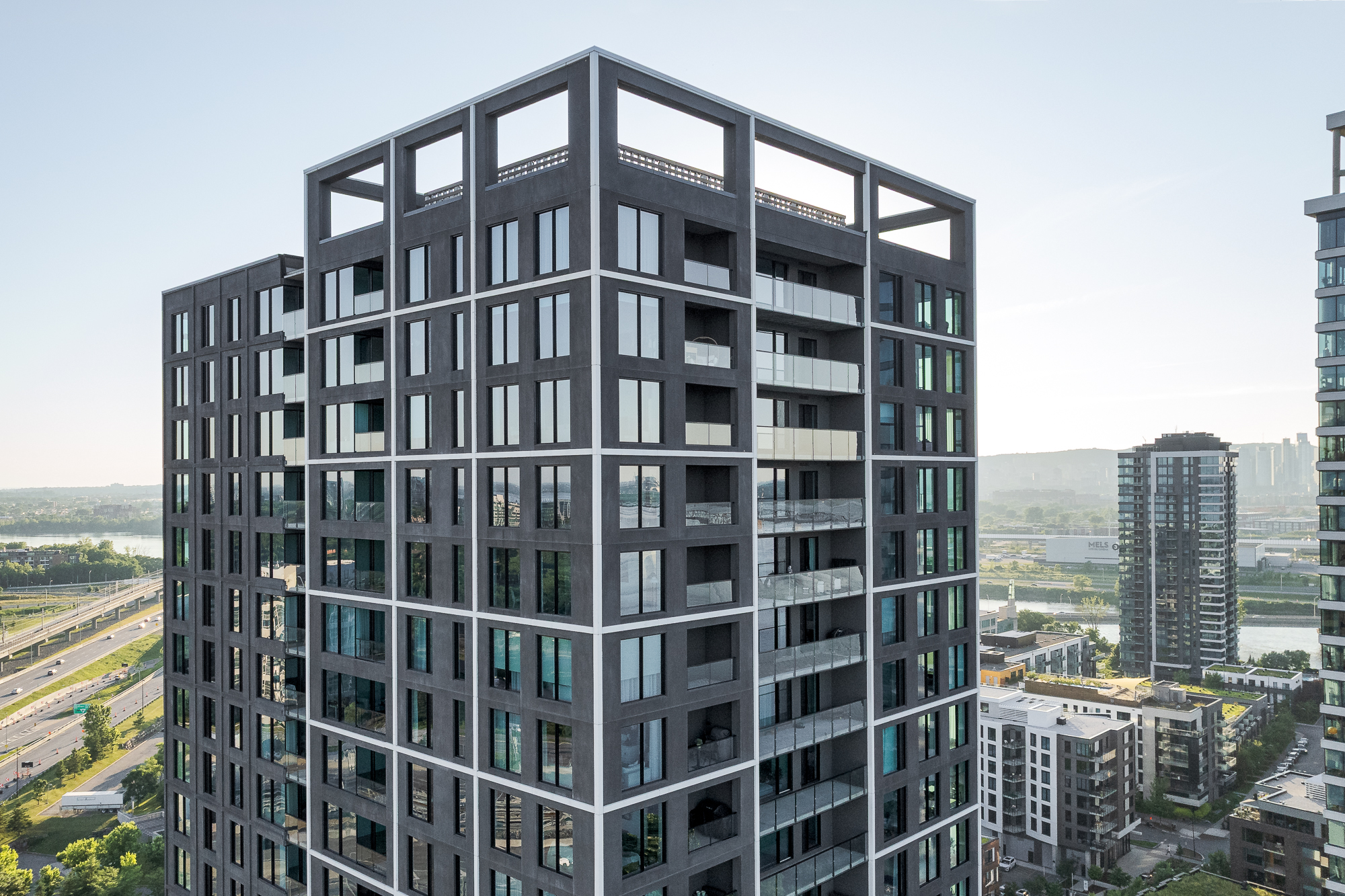 Details of the glazed façade of Evolo NEX capturing daylight.