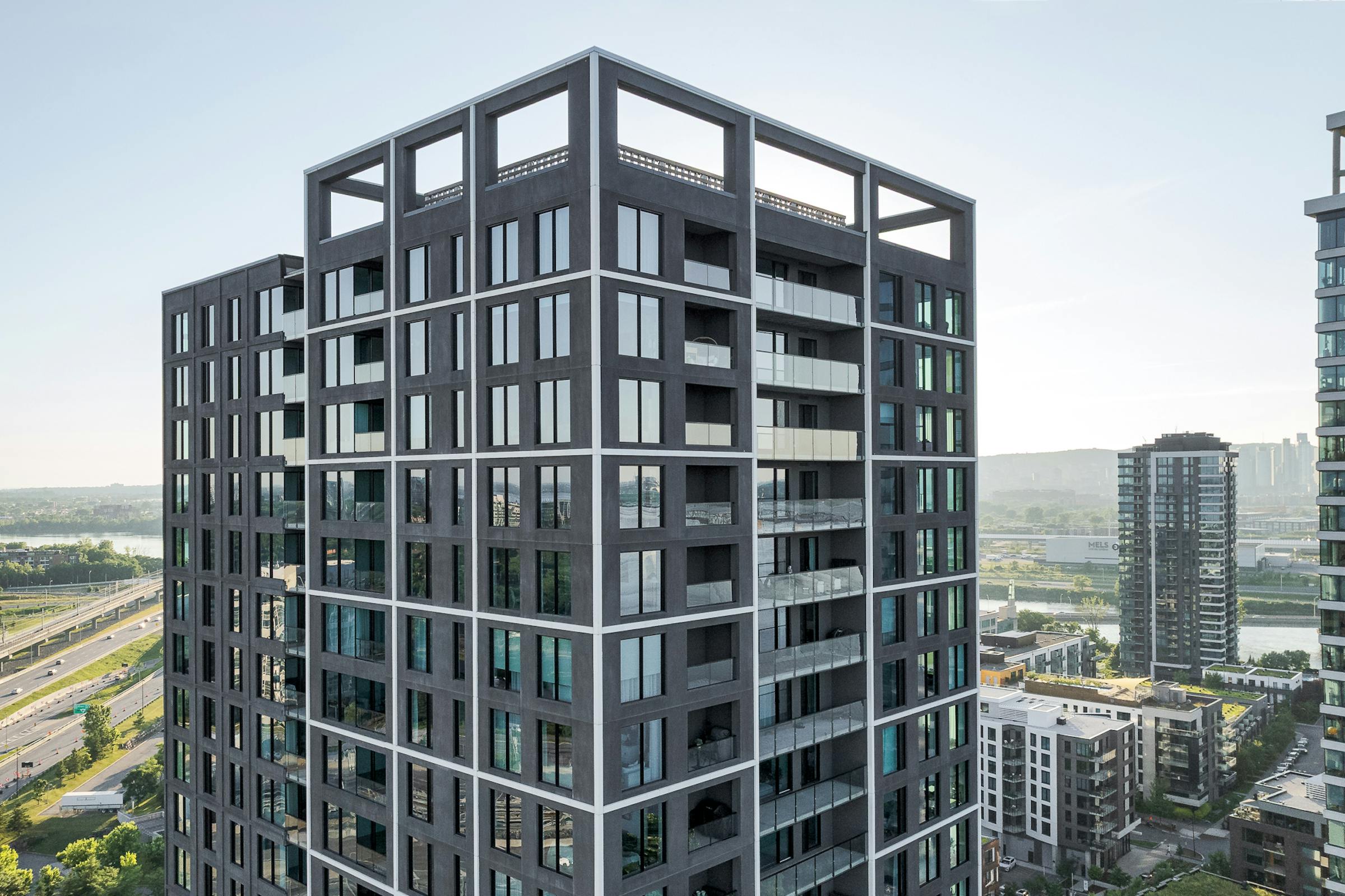 Details of the glazed façade of Evolo NEX capturing daylight.