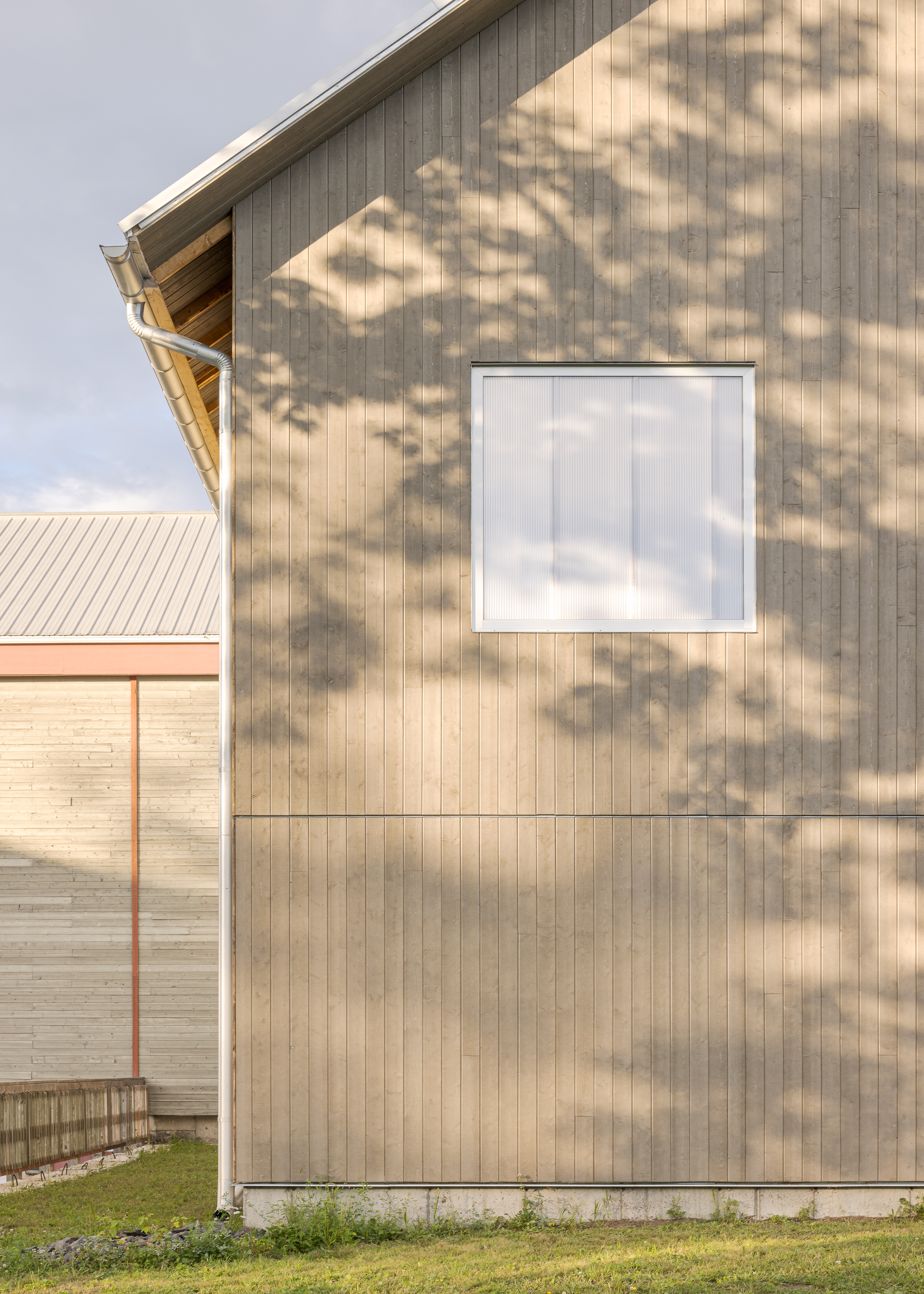 Wood facades and contemporary architectural treatments.